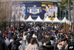 Fans make their way to the stadium prior to the 2024 Seoul Series game between Los Angeles Dodgers and San Diego Padres at Gocheok Sky Dom in Seoul, South Korea, March 20, 2024.