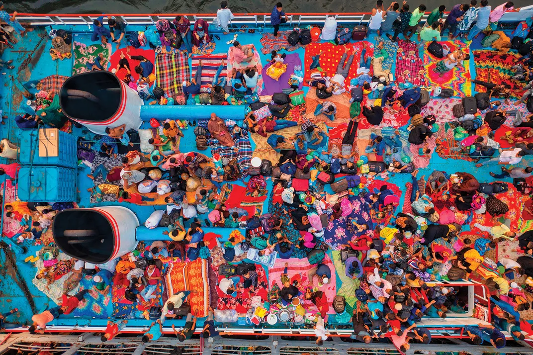 a aerial view of the people traveling on a boat